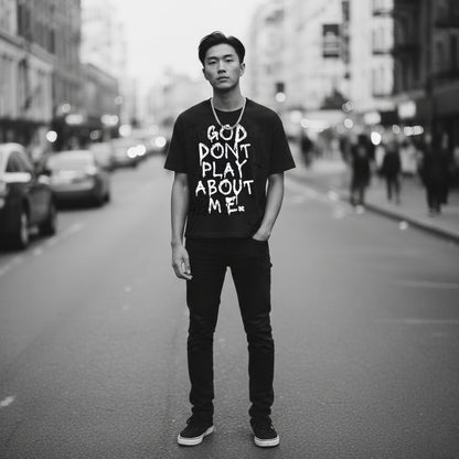 GOD DON’T PLAY ABOUT ME – Unisex Boxy Cotton T-Shirt (Black)